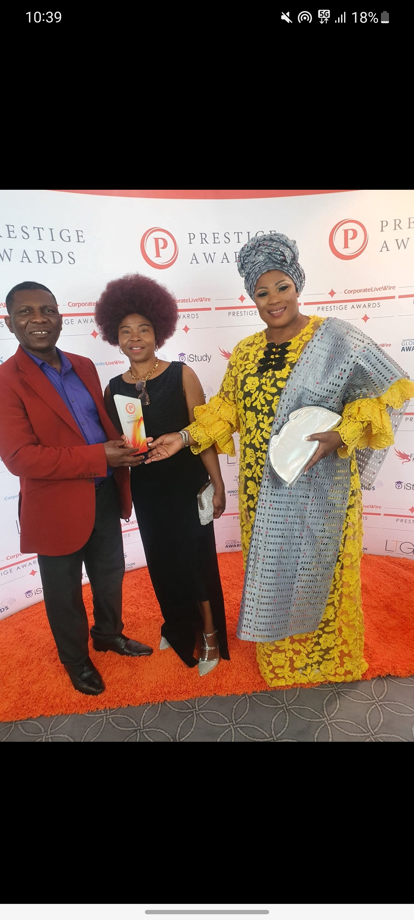 Founder with partners receiving award